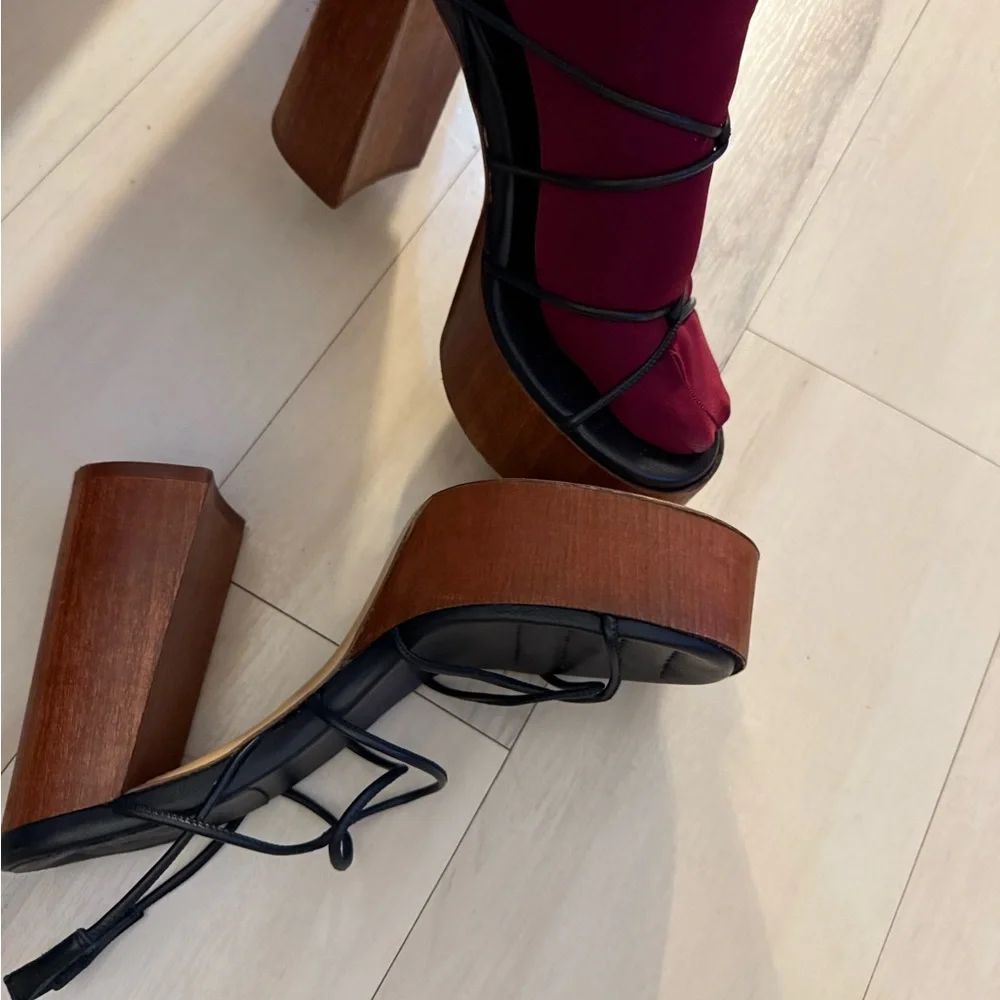 Gia Borghini x RHW Rosie 28 strappy platform sandals with a wood-effect heel.